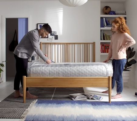 remove packaging from rolled mattress